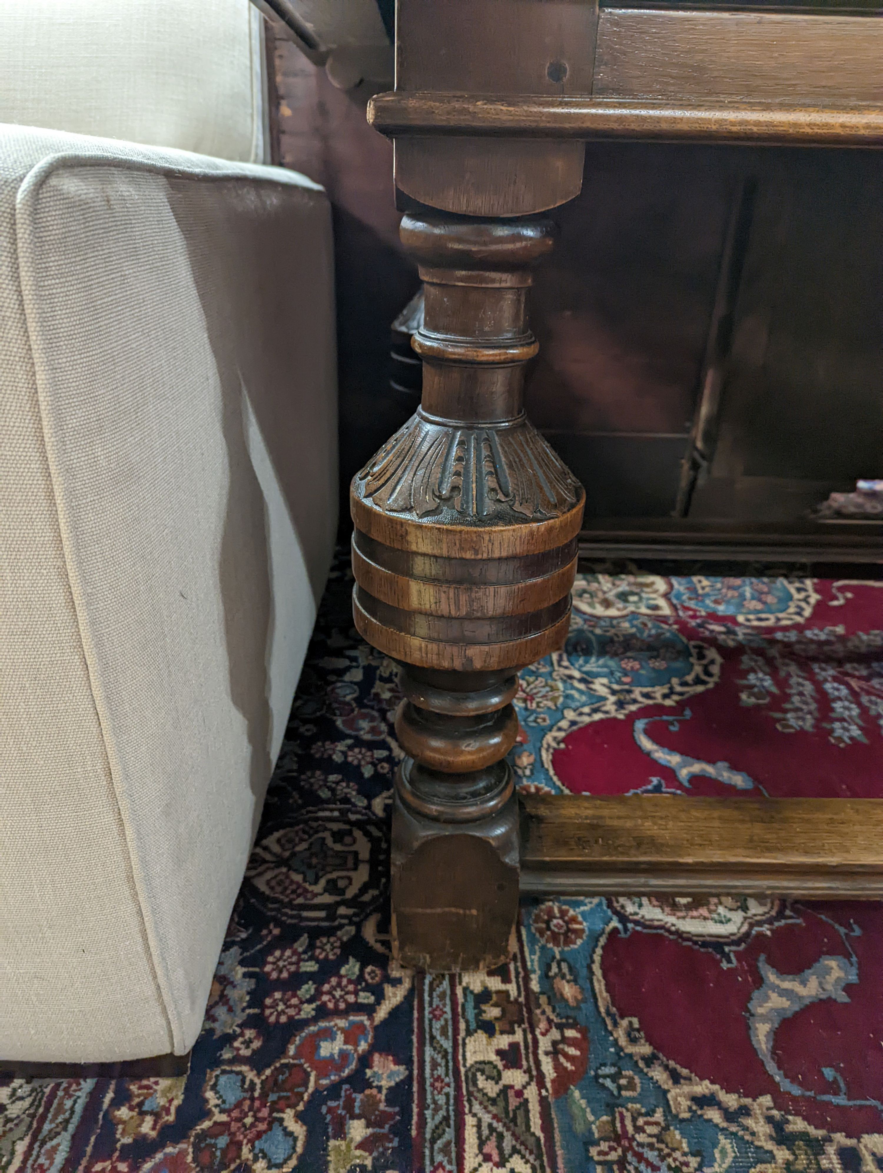 An 18th century style pale oak draw leaf dining table on carved baluster legs, length 242cm extended, depth 91cm, height 75cm